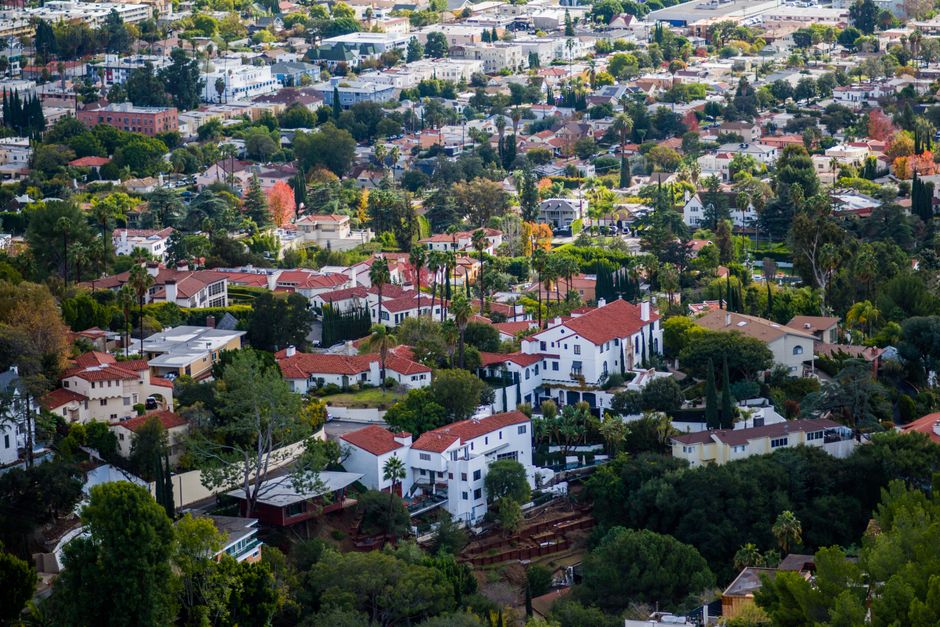 Rows of tile-roofed housing seen from above