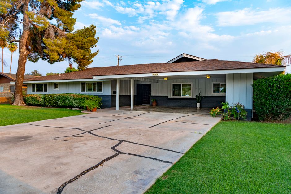 A single-storey ranch-style home on a large lot