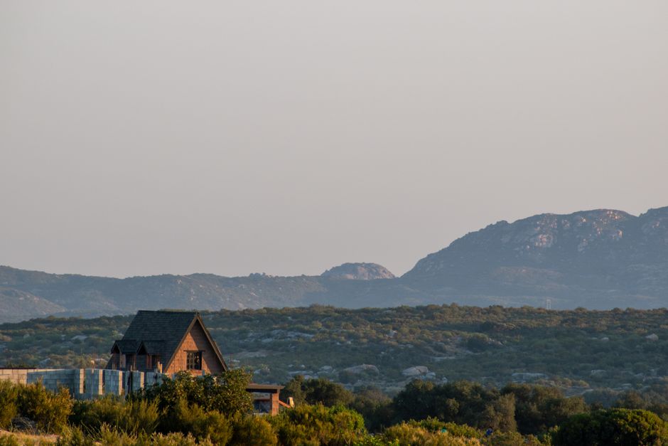 A home on a larger lot below dry inland hills